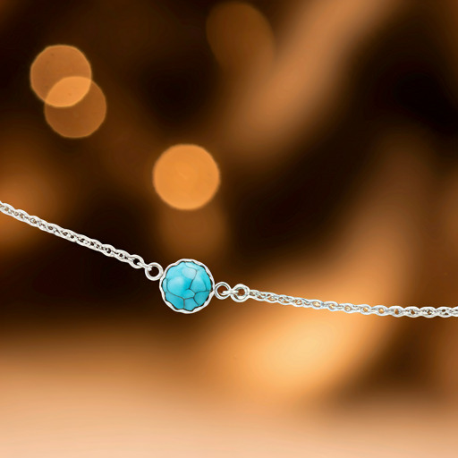 Tobillera de plata con conchas